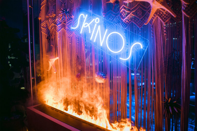 Skinos sign above fire place