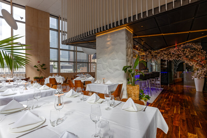 Dining room with many set tables