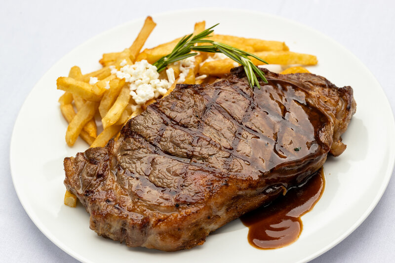 Steak entree with side of french fries